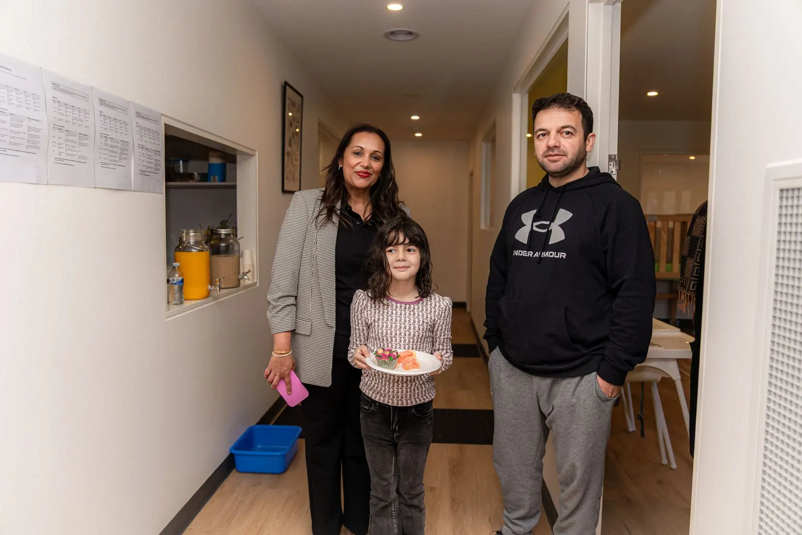 A family exploring the centre together during a visit