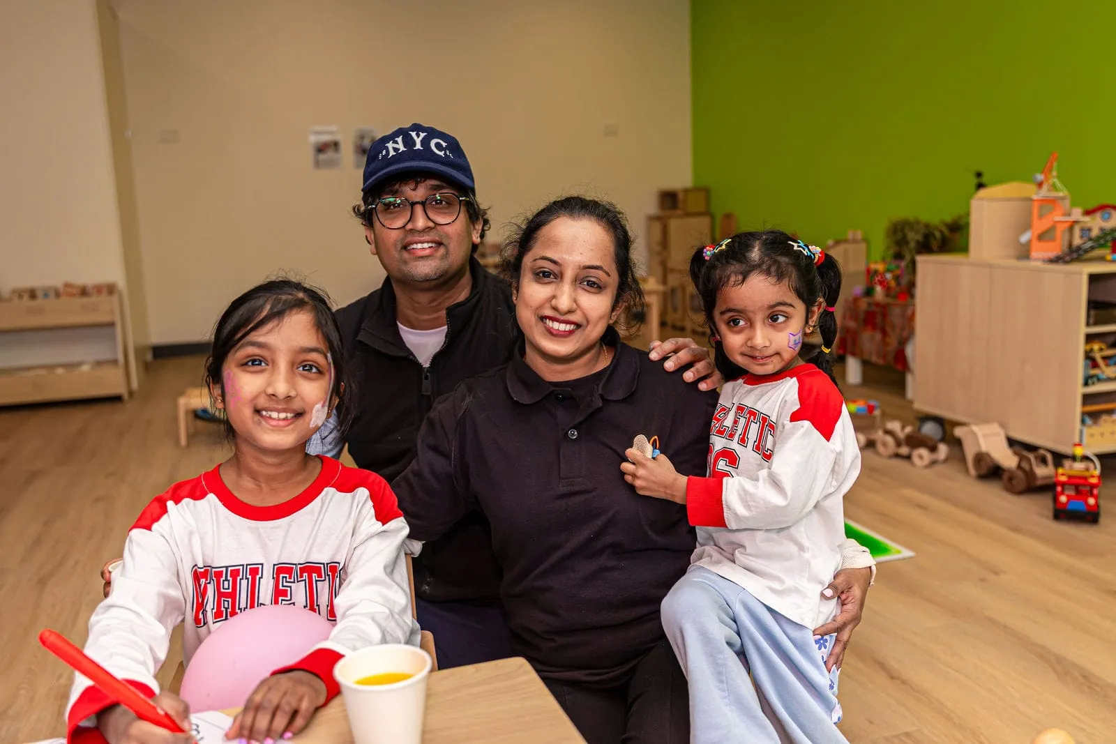 A family at the opening, at the YoMy Sunshine grand opening in Dandenong North