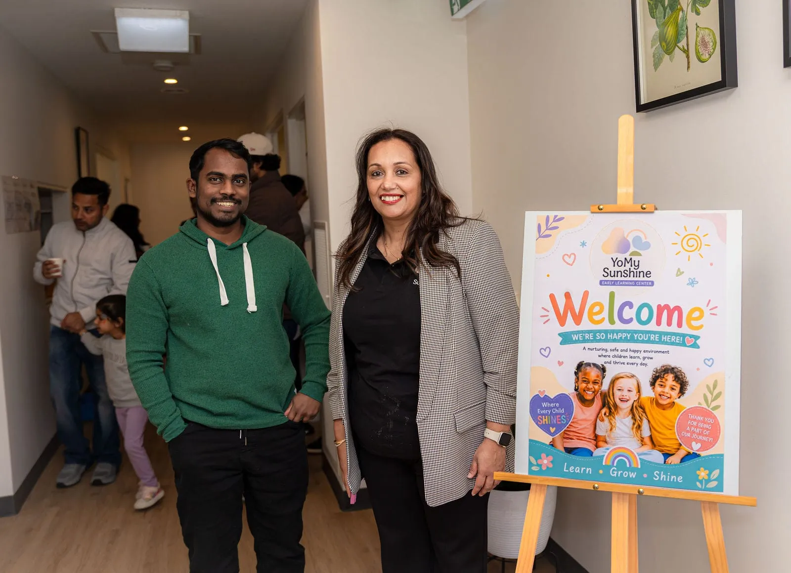 Welcoming guests at the entrance, at the YoMy Sunshine grand opening in Dandenong North