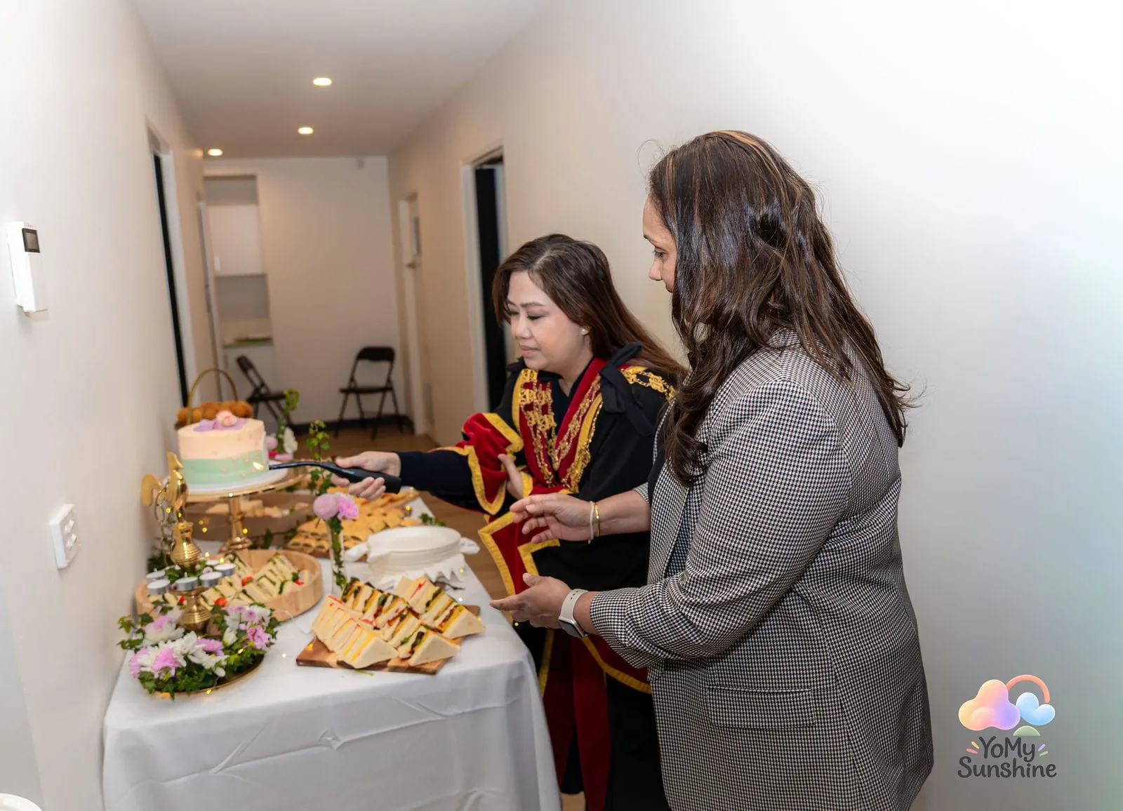The Mayor cutting the cake, at the YoMy Sunshine grand opening in Dandenong North