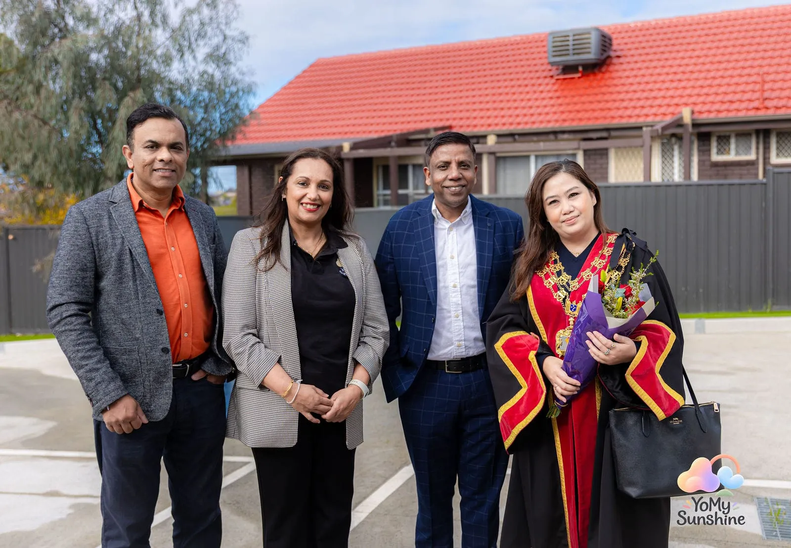 Celebrating together outside, at the YoMy Sunshine grand opening in Dandenong North
